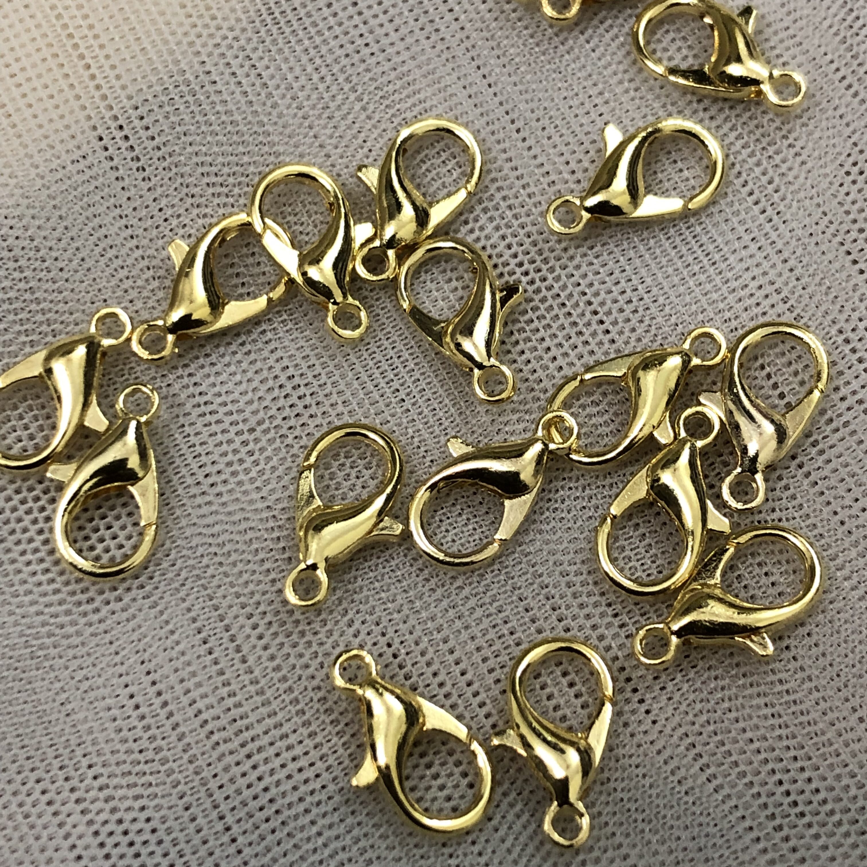 Essentials - Fish hook(gold)
